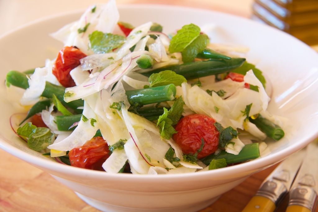 This Green Bean & Fennel Salad with Roasted Tomatoes is a delightful medley of flavors and textures. The green beans are blanched to a perfect crisp-tenderness, while the fennel adds a fresh, aromatic crunch.
