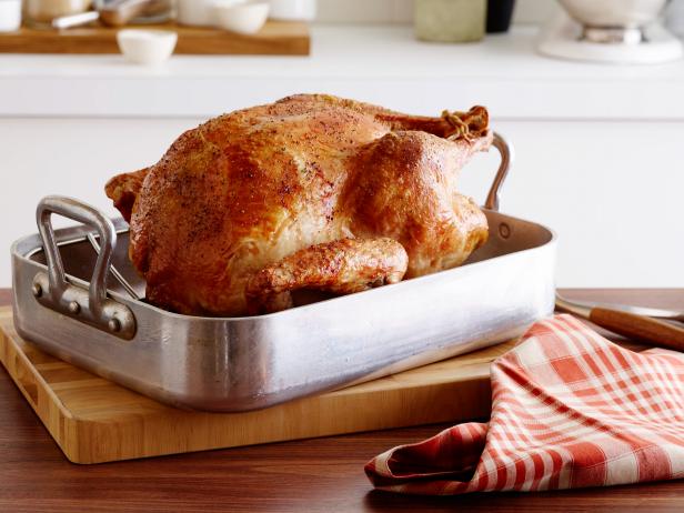 Cooking the perfect roast turkey is actually quite simple. You can prepare the turkey ahead so it's ready for the oven on Christmas Day - all you have to do is bring it to room temperature first.